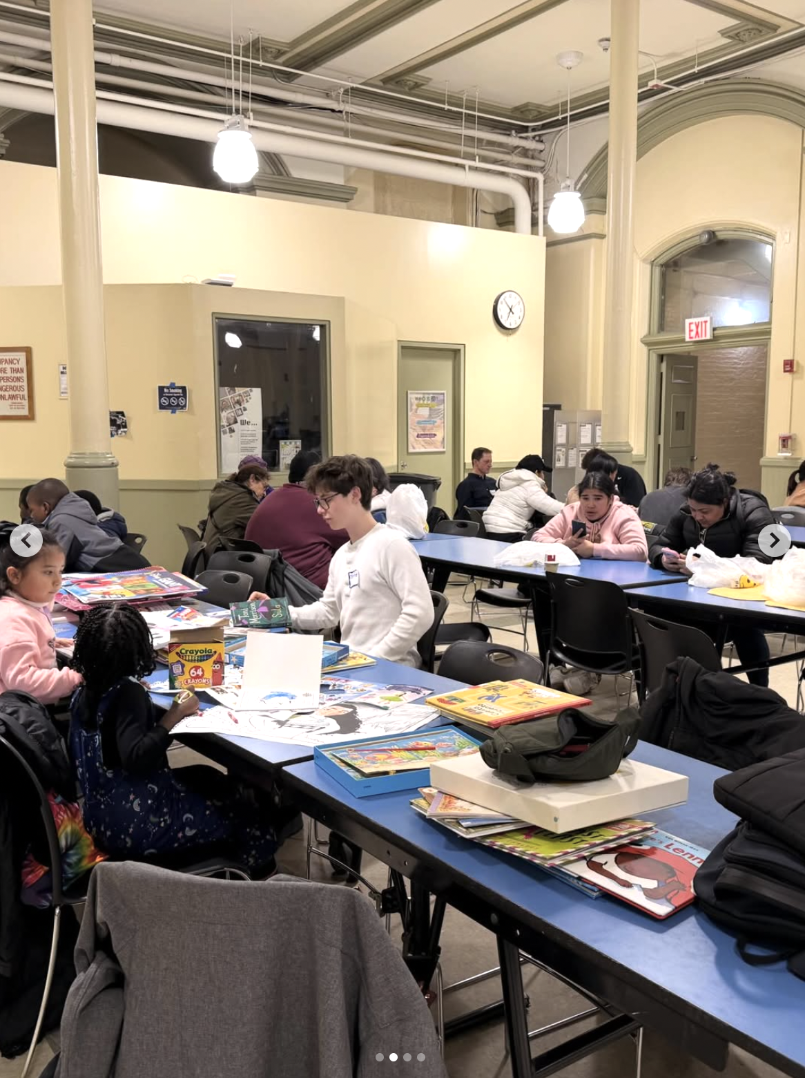 Volunteers offering translation support at the New Sanctuary Coalition