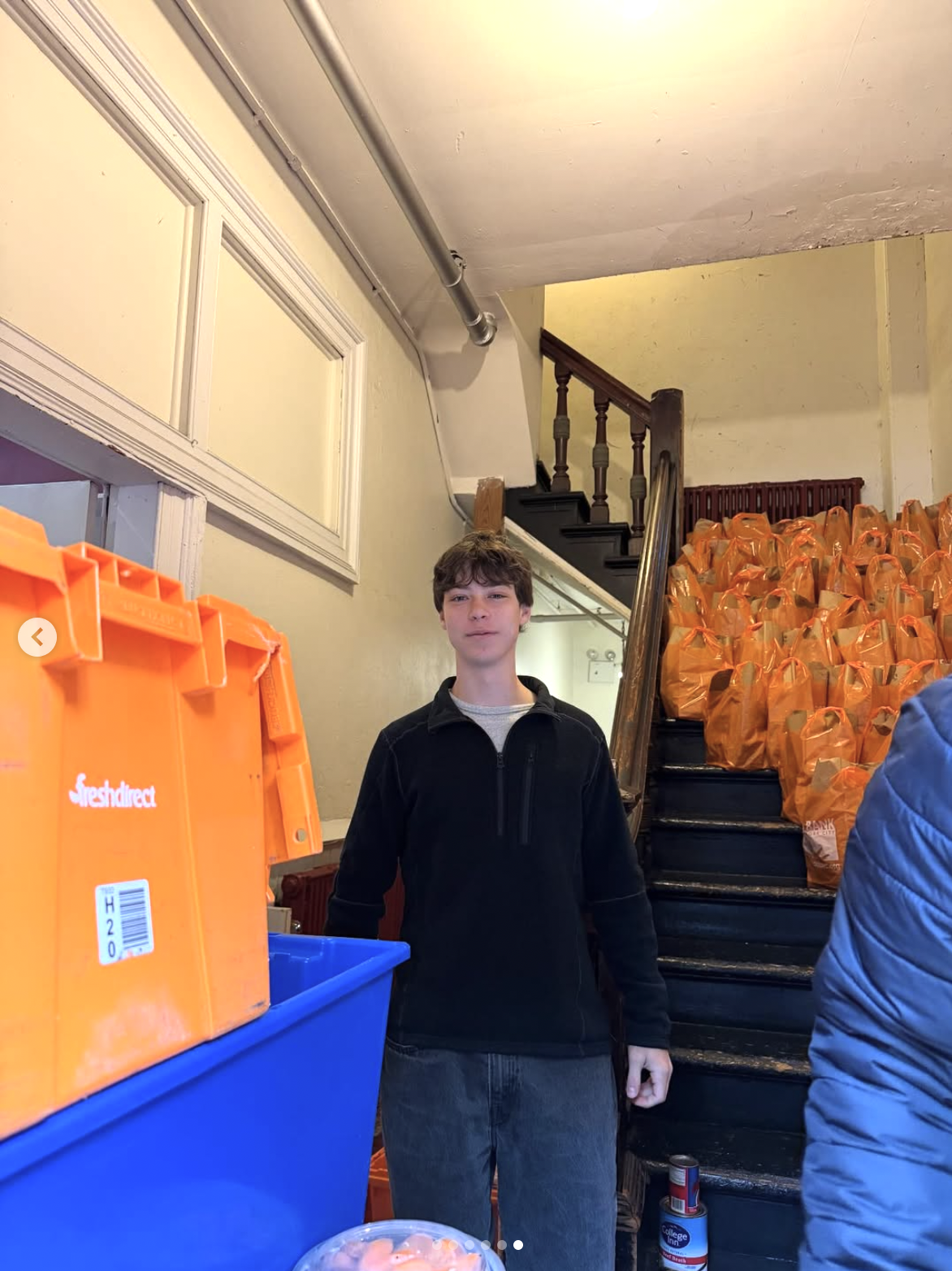 Volunteers distributing meals at St. Clement's Food Pantry